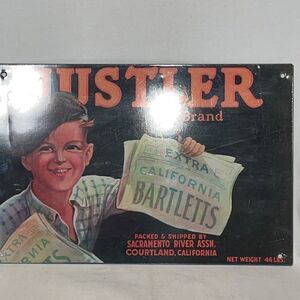 Hustler brand sign  